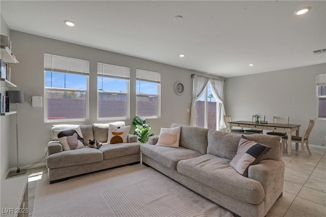 10630 Adobe Ranch St, Las Vegas, NV 89141 - living room featuring light tile patterned floors and recessed lighting