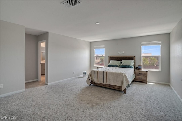 10630 Adobe Ranch St, Las Vegas, NV 89141 - bedroom featuring light colored carpet and multiple windows