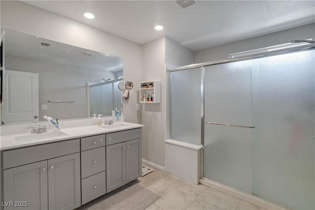 10630 Adobe Ranch St, Las Vegas, NV 89141 - full bath with a shower stall, double vanity, and tile patterned floors