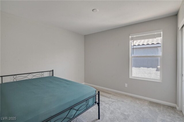 10630 Adobe Ranch St, Las Vegas, NV 89141 - bedroom featuring light carpet and baseboards