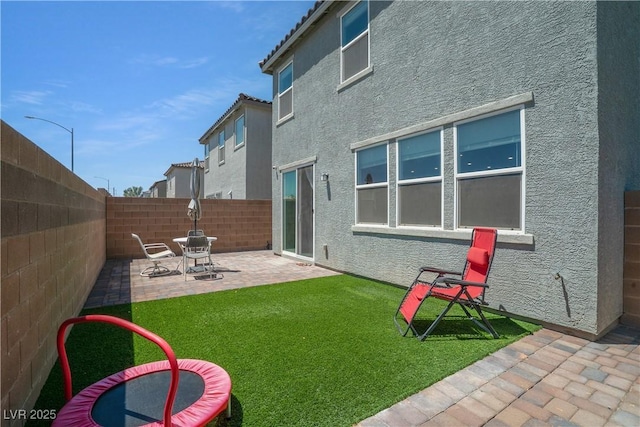 10630 Adobe Ranch St, Las Vegas, NV 89141 - fenced backyard featuring a patio area