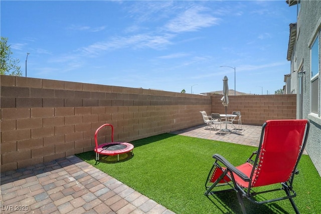 10630 Adobe Ranch St, Las Vegas, NV 89141 - fenced backyard featuring a patio area