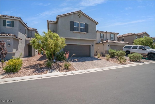 10630 Adobe Ranch St, Las Vegas, NV 89141 - mediterranean / spanish-style home featuring a garage, stucco siding, driveway, and a tiled roof