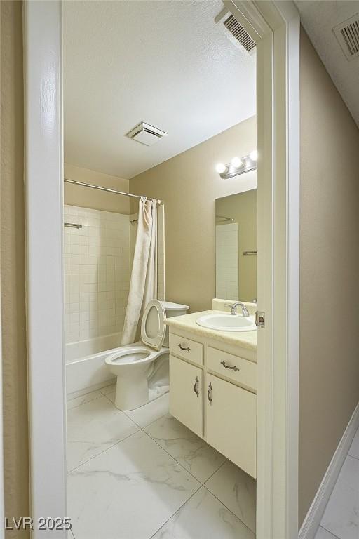 4420 Rich Dr Unit B, Las Vegas, NV 89102 - full bath featuring vanity, marble finish flooring, and shower / tub combo with curtain
