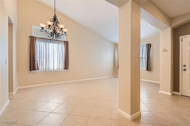 7559 Chambery Cove Ct, Las Vegas, NV 89123 - foyer entrance with light tile patterned flooring, a chandelier, vaulted ceiling, and arched walkways