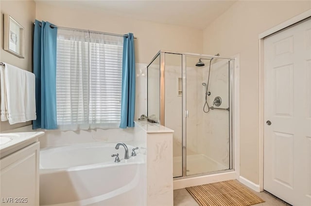 7559 Chambery Cove Ct, Las Vegas, NV 89123 - bathroom with a stall shower, a bath, vanity, and tile patterned floors