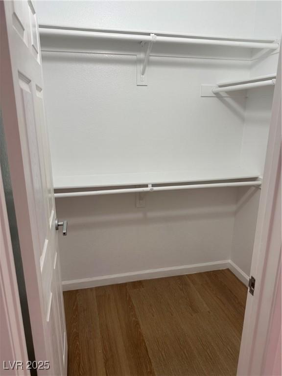 7885 W Flamingo Rd Unit 2129, Las Vegas, NV 89147 - walk in closet with wood finished floors