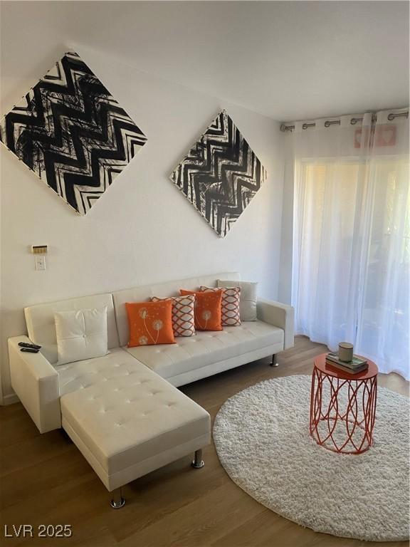 7885 W Flamingo Rd Unit 2129, Las Vegas, NV 89147 - living room with wood finished floors