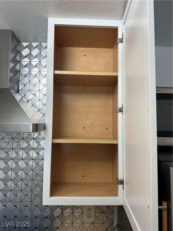7885 W Flamingo Rd Unit 2129, Las Vegas, NV 89147 - detailed view of wall chimney exhaust hood