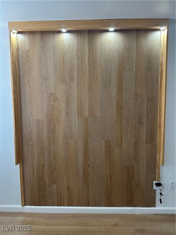 7885 W Flamingo Rd Unit 2129, Las Vegas, NV 89147 - detailed view of baseboards and wood finished floors