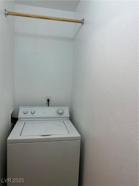 7885 W Flamingo Rd Unit 2129, Las Vegas, NV 89147 - laundry room featuring washer / dryer