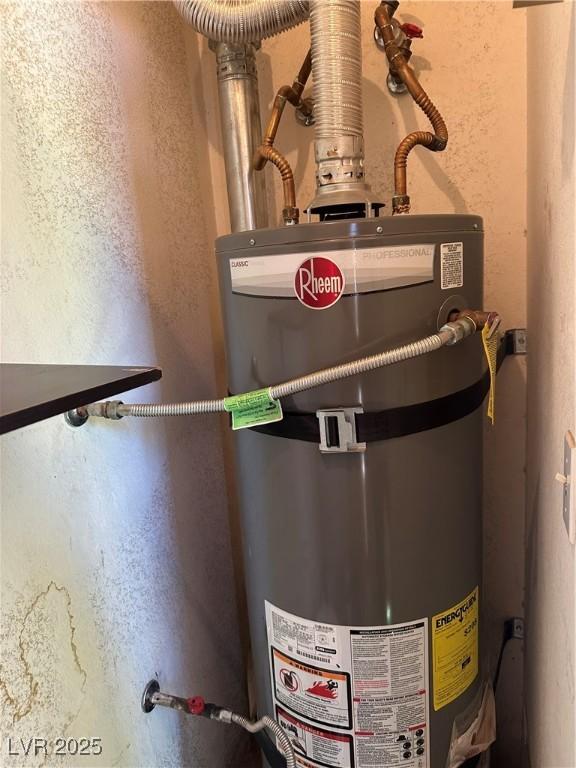 7885 W Flamingo Rd Unit 2129, Las Vegas, NV 89147 - utility room featuring secured water heater
