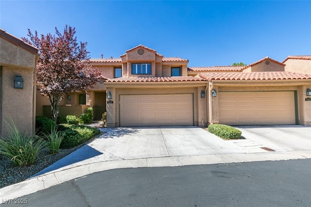 7132 Mission Hills Dr, Las Vegas, NV 89113 - view of front of property with driveway, stucco siding, an attached garage, and a tile roof