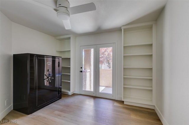 7132 Mission Hills Dr, Las Vegas, NV 89113 - doorway to outside featuring a ceiling fan and light wood-style flooring