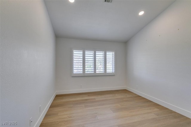 7132 Mission Hills Dr, Las Vegas, NV 89113 - spare room with light wood finished floors and recessed lighting