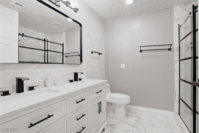 4490 W Warm Springs Rd, Las Vegas, NV 89118 - bathroom featuring double vanity, a marble finish shower, and marble finish floors