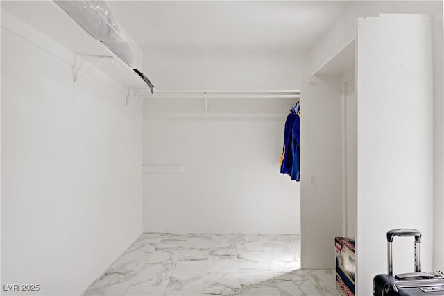 4490 W Warm Springs Rd, Las Vegas, NV 89118 - walk in closet featuring marble look tile flooring