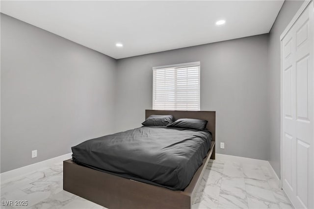 4490 W Warm Springs Rd, Las Vegas, NV 89118 - bedroom with marble look tile flooring and recessed lighting