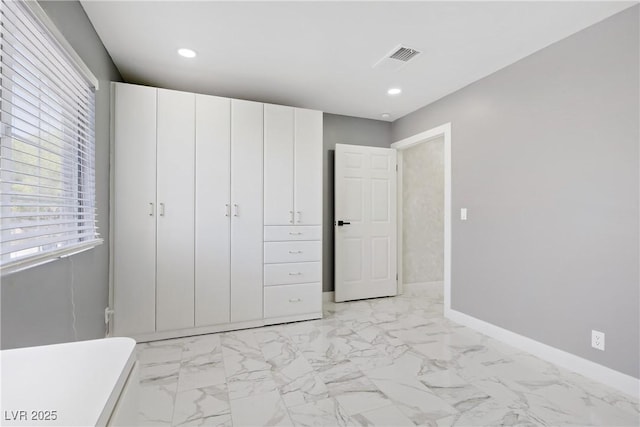 4490 W Warm Springs Rd, Las Vegas, NV 89118 - unfurnished bedroom featuring light marble finish floors and recessed lighting