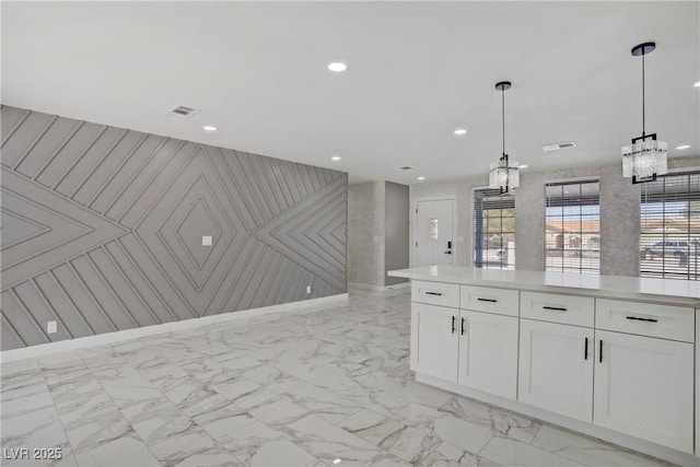 4490 W Warm Springs Rd, Las Vegas, NV 89118 - kitchen featuring light marble finish flooring, light countertops, white cabinets, and recessed lighting
