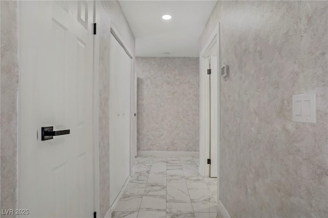 4490 W Warm Springs Rd, Las Vegas, NV 89118 - corridor featuring light marble finish flooring and recessed lighting