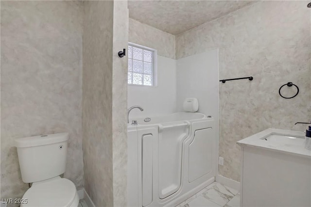 4490 W Warm Springs Rd, Las Vegas, NV 89118 - bathroom featuring a bath, vanity, and marble finish flooring