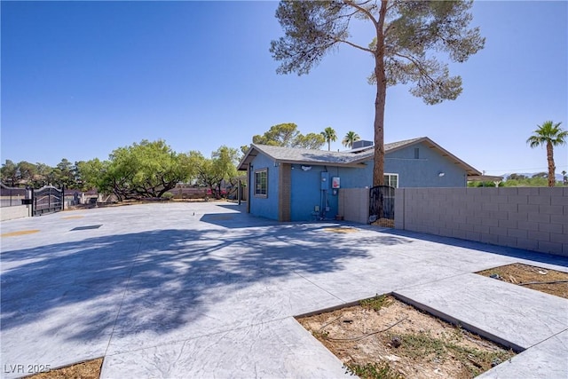 4490 W Warm Springs Rd, Las Vegas, NV 89118 - back of property with a gate