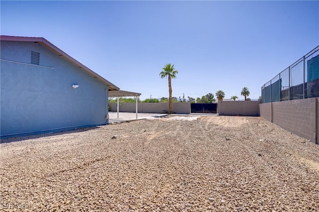 4490 W Warm Springs Rd, Las Vegas, NV 89118 - view of yard featuring a patio area