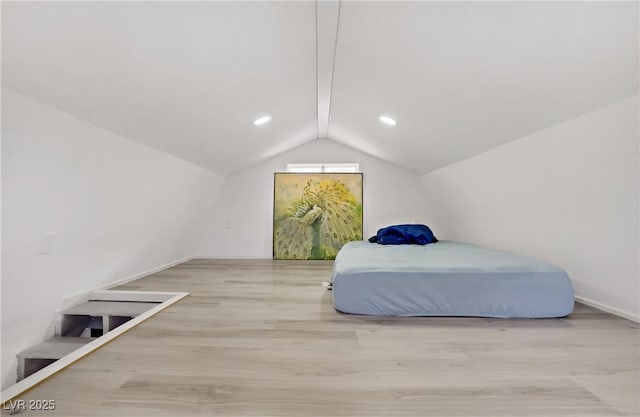 4490 W Warm Springs Rd, Las Vegas, NV 89118 - bedroom with lofted ceiling, wood finished floors, and recessed lighting