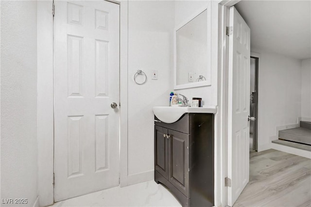 4490 W Warm Springs Rd, Las Vegas, NV 89118 - bathroom featuring vanity and wood finished floors