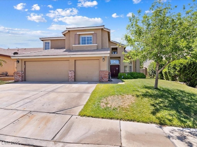 1870 Desert Forest Way, Henderson, NV 89012 - view of front of home with stucco siding, concrete driveway, a front yard, and brick siding