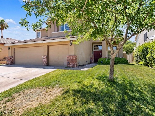 1870 Desert Forest Way, Henderson, NV 89012 - view of front facade featuring driveway, a front lawn, stucco siding, and brick siding
