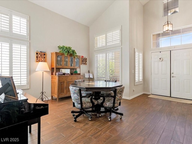 1870 Desert Forest Way, Henderson, NV 89012 - foyer entrance featuring high vaulted ceiling, plenty of natural light, and wood finished floors