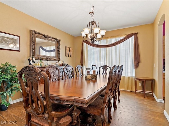 1870 Desert Forest Way, Henderson, NV 89012 - dining room featuring a chandelier and wood finished floors