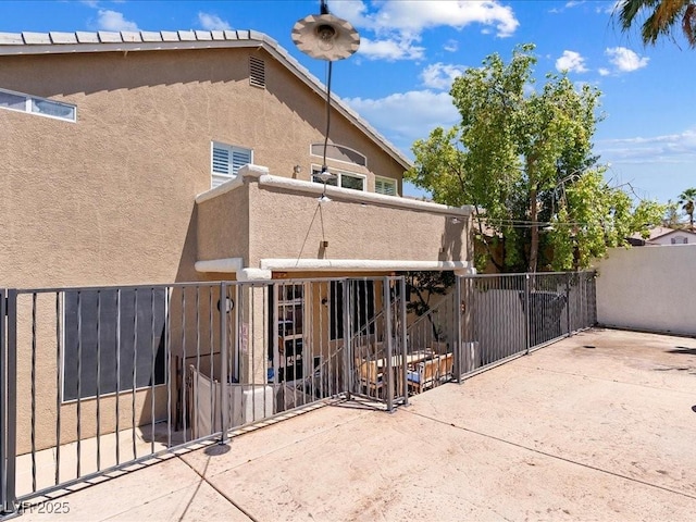 1870 Desert Forest Way, Henderson, NV 89012 - back of property featuring stucco siding and a patio area