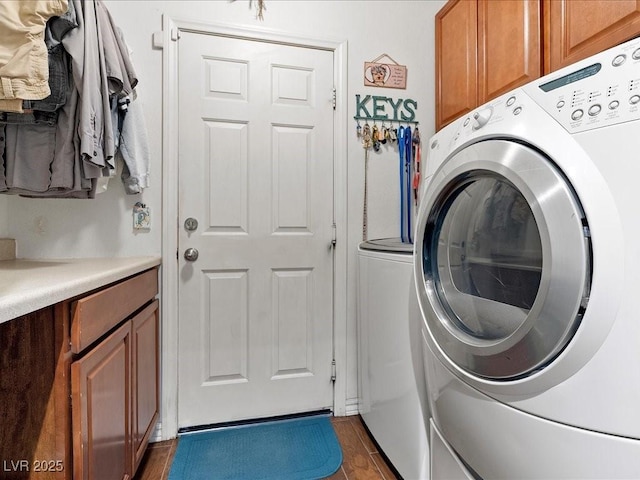 1870 Desert Forest Way, Henderson, NV 89012 - laundry area featuring cabinet space and washing machine and dryer