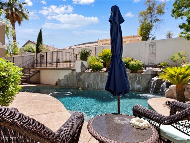 1870 Desert Forest Way, Henderson, NV 89012 - view of swimming pool with stairway and a fenced backyard