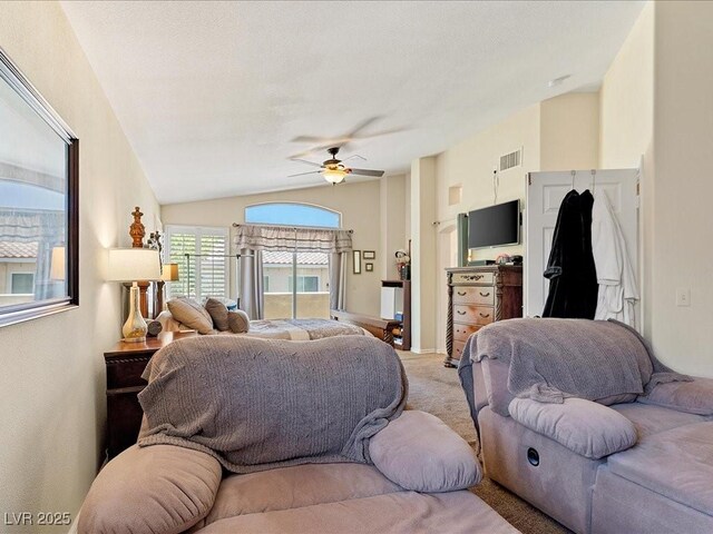 1870 Desert Forest Way, Henderson, NV 89012 - living room with ceiling fan, light colored carpet, and vaulted ceiling