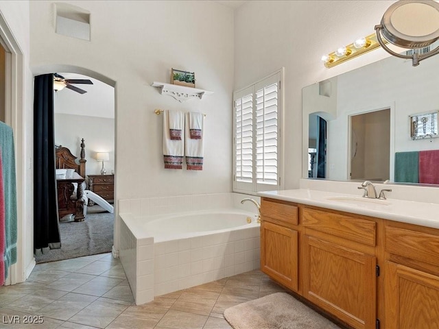 1870 Desert Forest Way, Henderson, NV 89012 - bathroom with vanity, a bath, tile patterned floors, and ceiling fan