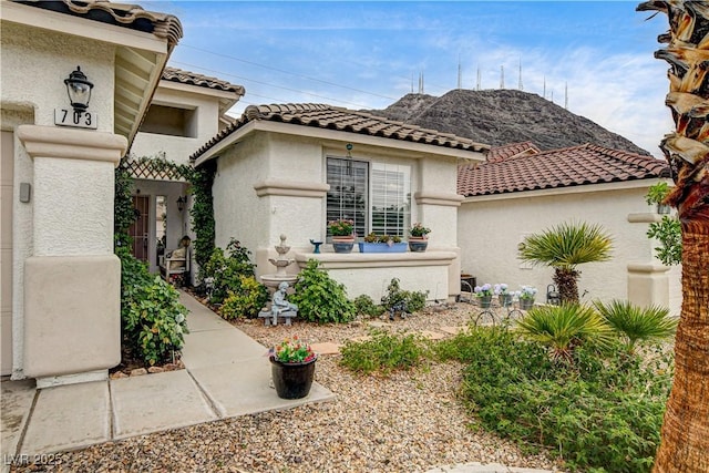703 Jane Eyre Pl, Henderson, NV 89002 - view of front facade featuring stucco siding and a tile roof