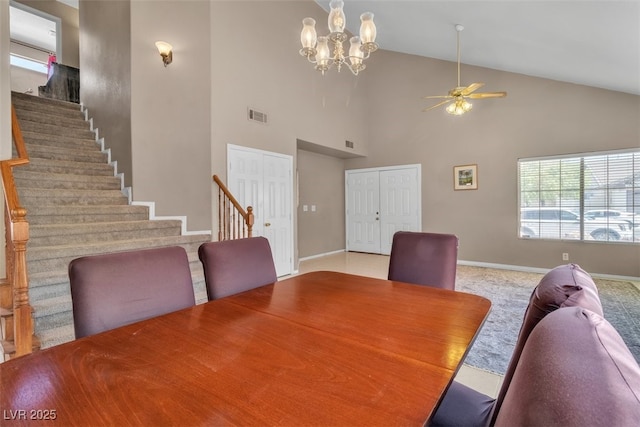 7720 Leavorite Dr, Las Vegas, NV 89128 - dining room with stairs, ceiling fan, high vaulted ceiling, and a chandelier