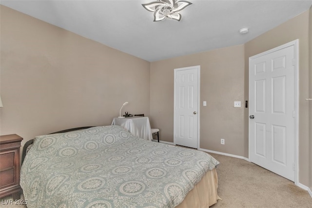 7720 Leavorite Dr, Las Vegas, NV 89128 - bedroom with light carpet and baseboards