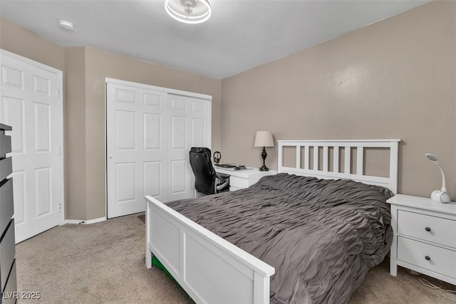 7720 Leavorite Dr, Las Vegas, NV 89128 - bedroom with light colored carpet, a closet, and an office area