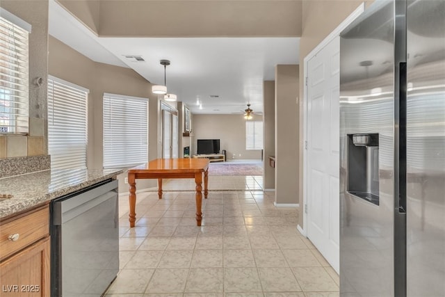 7720 Leavorite Dr, Las Vegas, NV 89128 - kitchen featuring appliances with stainless steel finishes, a ceiling fan, open floor plan, decorative light fixtures, and light tile patterned floors