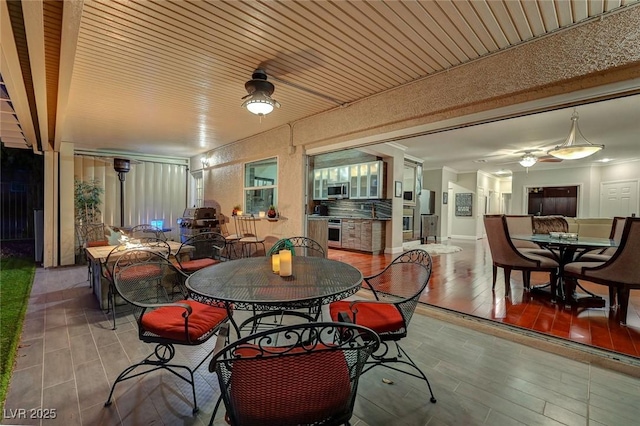 10621 Tinta Ln, Las Vegas, NV 89144 - dining area with ceiling fan and wood finished floors