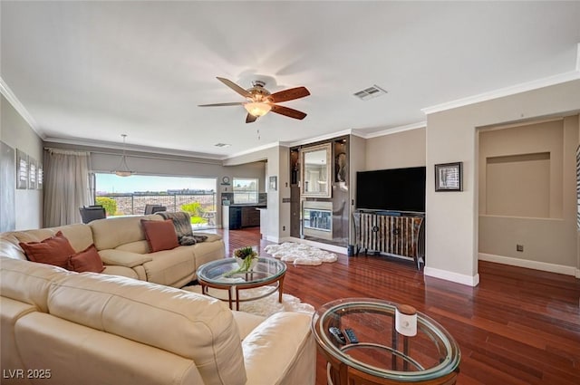 10621 Tinta Ln, Las Vegas, NV 89144 - living room with ornamental molding, wood finished floors, and a ceiling fan