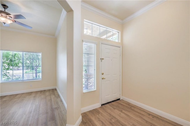 1869 Desert Forest Way, Henderson, NV 89012 - entryway with crown molding, light wood-type flooring, healthy amount of natural light, and ceiling fan