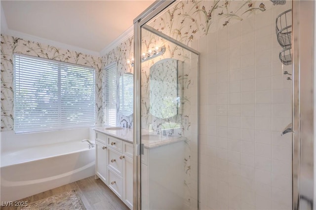 1869 Desert Forest Way, Henderson, NV 89012 - full bath featuring double vanity, a stall shower, a bath, wood finished floors, and crown molding