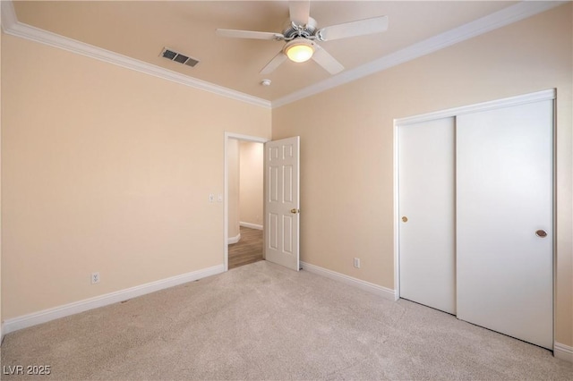 1869 Desert Forest Way, Henderson, NV 89012 - unfurnished bedroom featuring ornamental molding, carpet floors, a closet, and a ceiling fan