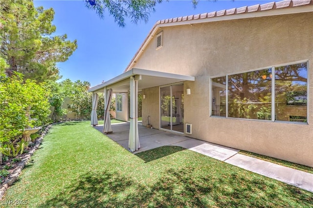 1869 Desert Forest Way, Henderson, NV 89012 - view of green lawn featuring a patio